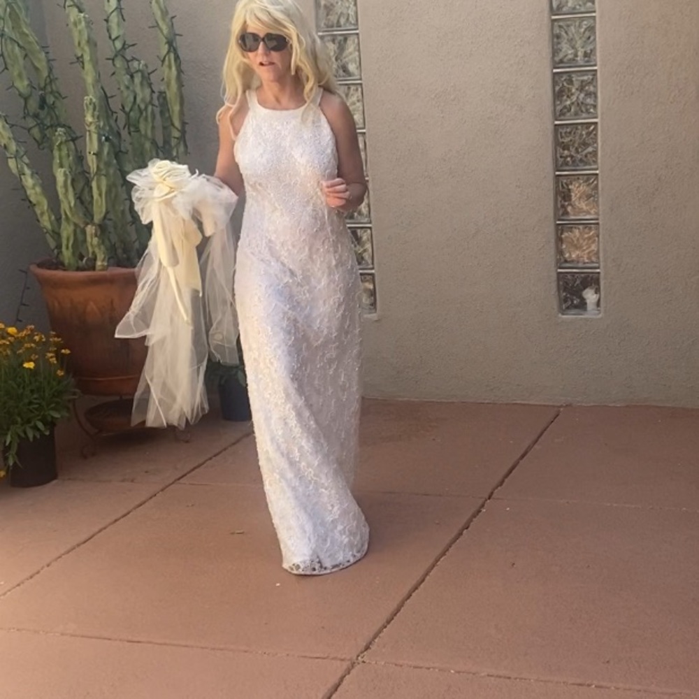 Scala lace and beaded wedding gown